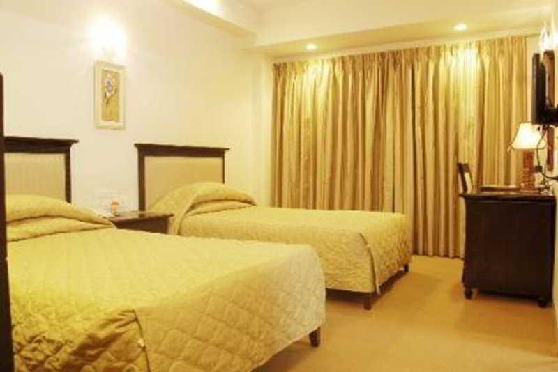 Hotel Mandakini Ambience Púna Pokoj fotografie